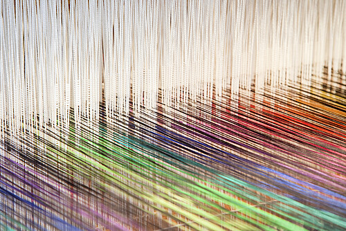 Colorful threads on a loom (XXL)